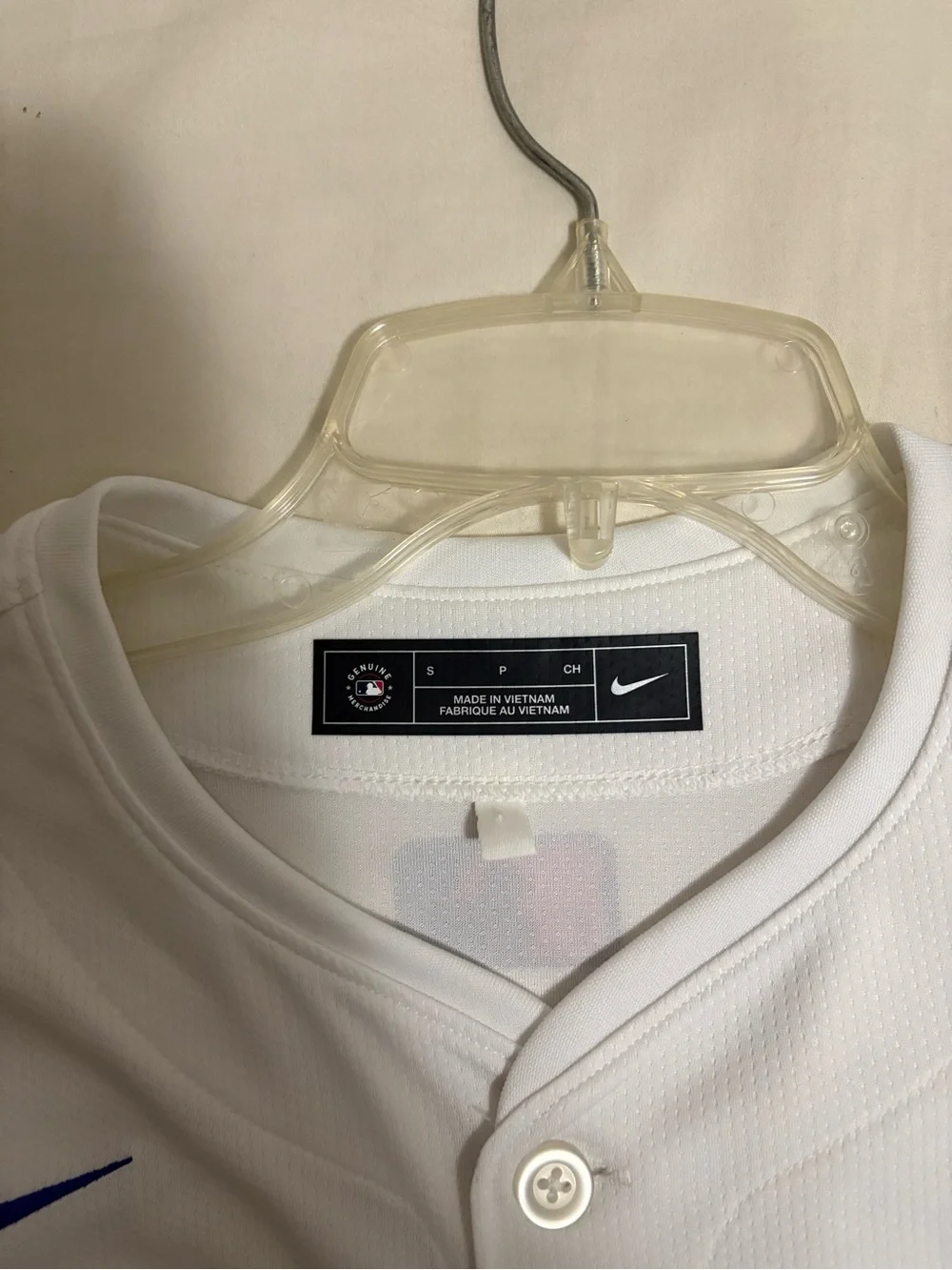 Nike White Baseball Jersey with Blue Swoosh